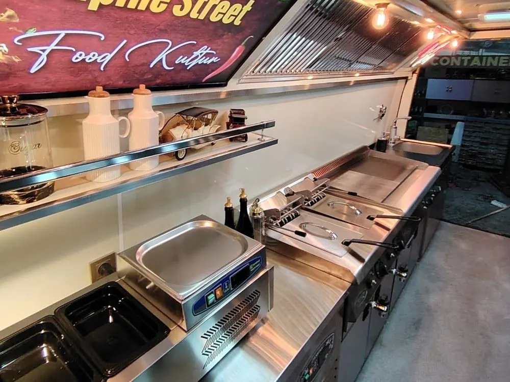 Stainless kitchen line inside the van