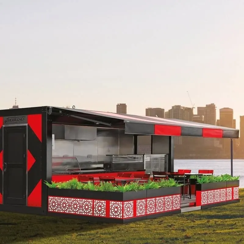 Red and black container that opens onto a terrace