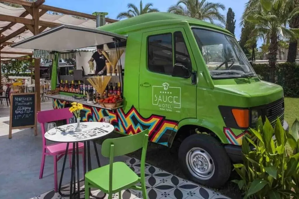 Sauce Hotel food truck at an evening event