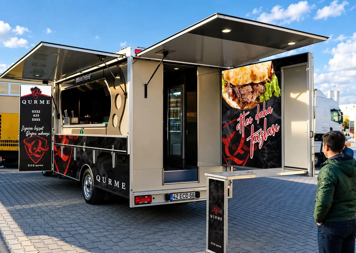 Qurme döner food truck with both serving hatches open and the side counter folded down